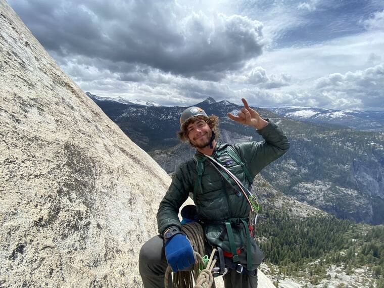 Halfway up and grinning